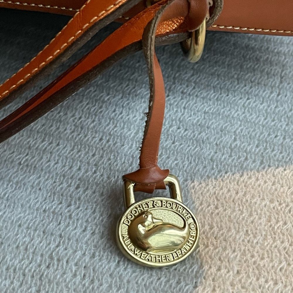 Vintage Dooney and Bourke Pebbled Leather Bucket Bag with brass accents - Picture 5 of 16